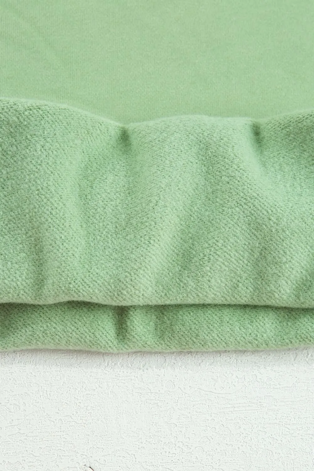Cozy fleece-lined sweatshirt in smoke green